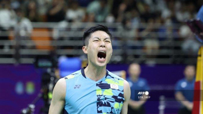 Chou Tien-chen dari Taiwan bereaksi selama pertandingan tunggal putra dengan HS Prannoy dari India pada kejuaraan bulu tangkis dunia Final Piala Sudirman 2023 di Suzhou, di provinsi Jiangsu timur China pada 14 Mei 2023.