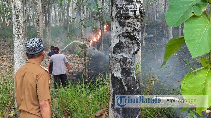 KARHUTLA BOLTARA - Kebakaran lahan terjadi di Desa Binuanga, Kecamatan Bolangitang Timur, Bolaang Mongondow Utara (Boltara), Sulut pada Selasa (28/07/2026) sore. Tim Damkar dan warga setempat melakukan pemadaman api.