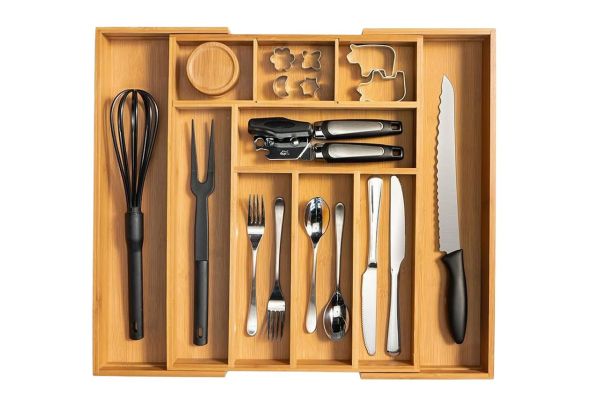 keechee Carbonized Bamboo Kitchen Drawer Organizer Credit: Amazon