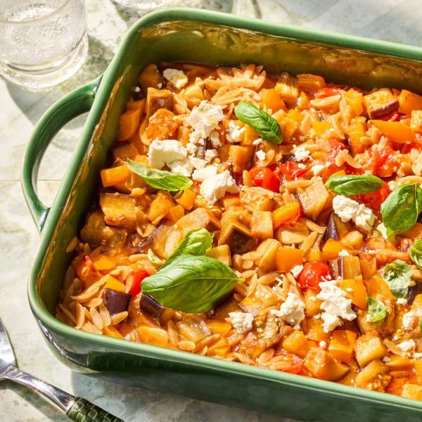 A recipe image of Roasted Tomato, Eggplant & Orzo Casserole. Credit: Photographer: Grant Webster, Food Stylist: Holly Dreesman, Prop Stylist: Dera Burreson.