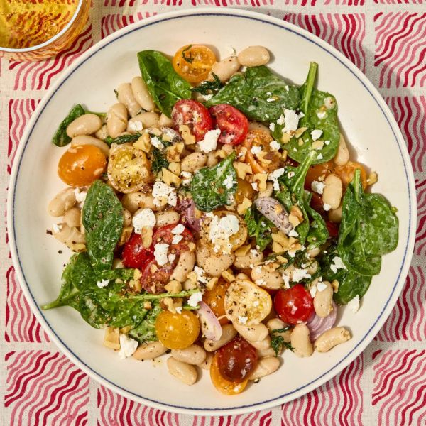an image of the No-Cook White Bean Salad with Feta & Lemon-Garlic Vinaigrette Credit: Photographer: Jen Causey, Food Stylist: Chelsea Zimmer, Prop Stylist: Claire Spollen