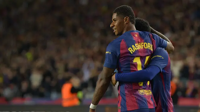Marcus Rashford Penyerang Barcelona, Marcus Rashford merayakan mencetak gol ketiga timnya selama pertandingan sepak bola liga Spanyol antara FC Barcelona dan Elche CF di Estadi Olimpic Lluis Companys di Barcelona pada 2 November 2025. (MANAURE QUINTERO/AFP)