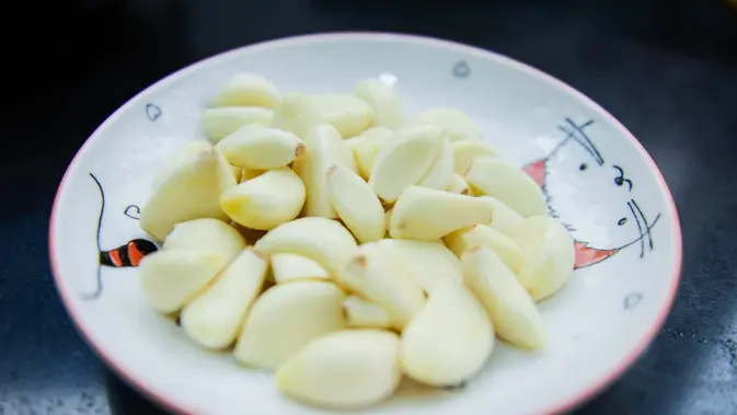 Mengonsumsi Bawang Putih Ilustrasi Bawang Putih Credit: pexels.com/Cats