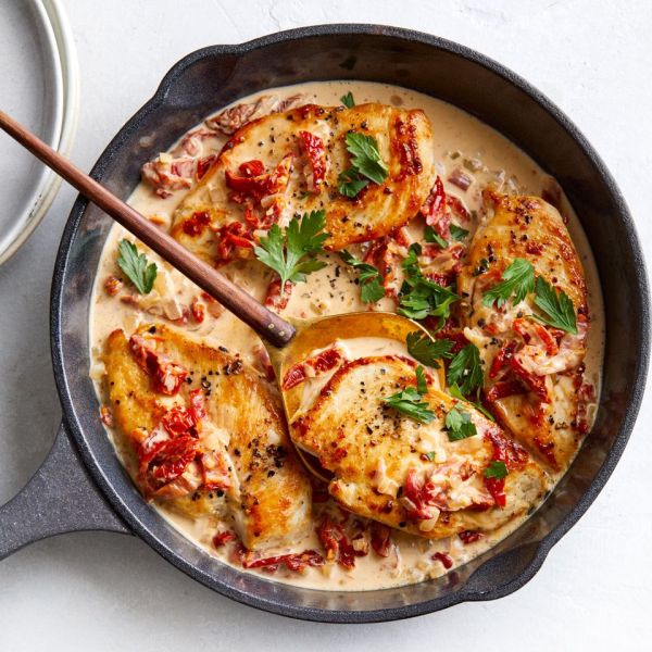 overhead image of Chicken Cutlets with Sun-Dried Tomato Cream Sauce Credit: Blaine Moats