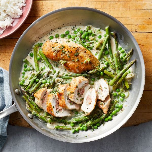 Prosciutto & Fontina Stuffed Chicken with Spring Vegetables Credit: Jacob Fox