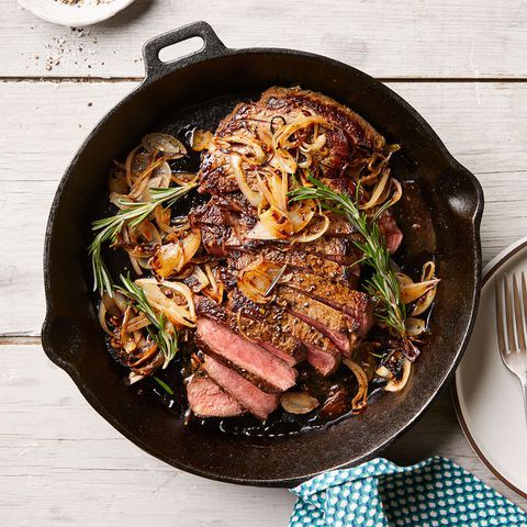 cast iron skillet with steak