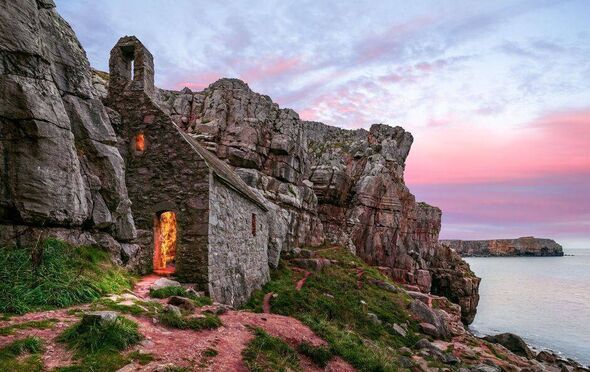 You can follow the route from the village towards the coastline, where you'll find a building unlike any other in Wales