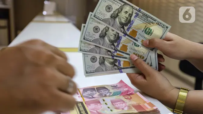 Ilustrasi rupiah dan dolar Amerika Serikat (Liputan6.com/Angga Yuniar)