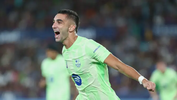 Pemain Barcelona, Ferran Torres, merayakan gol ke gawang Levante pada jornada kedua La Liga 2025/2026 di Estadio Ciudad de Valencia, Minggu (24/8/2025) dini hari WIB. (AP Photo/Alberto Saiz)