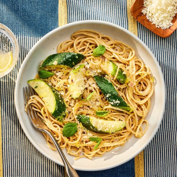 a recipe photo of the Lemon Zucchini Pasta Credit: Photographer: Robby Lozano, Food Stylist: Jennifer Wendorf, Prop Styling: Lindsey Lower