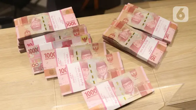Tumpukan mata uang Rupiah, Jakarta (Liputan6.com/Angga Yuniar)