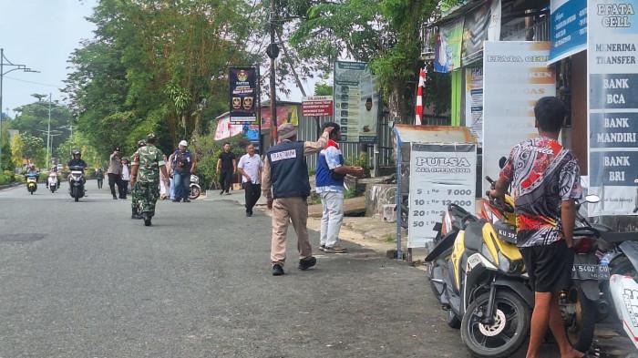 PENGAMANAN - Tampak kegiatan pengamanan di wilayah Jalan Kusuma Bangsa Kelurahan Gunung Lingkas Kota Tarakan saat kegiatan simulasi berlangsung, Rabu (5/8/2026).