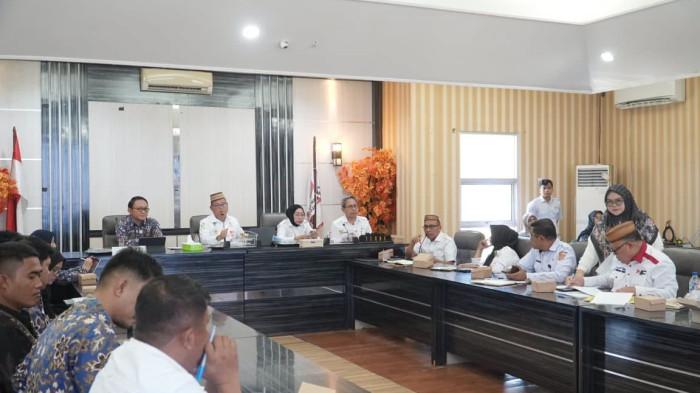 Bupati Gorontalo Utara, Thariq Modanggu menghadiri rapat  ddddsdsttty