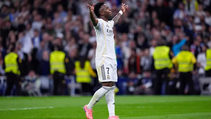 Ekspresi winger Real Madrid, Vinicius Junior usai membobol gawang Atletico Madrid, Senin (23/3/2026) (AP Photo/Manu Fernandez)