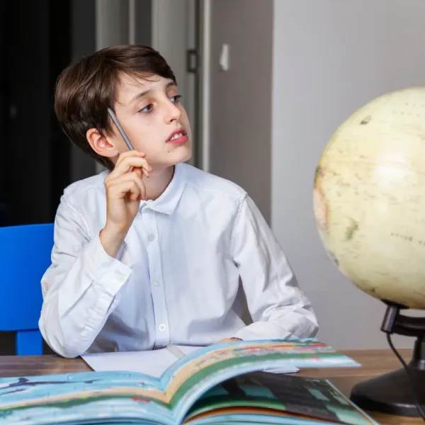 child thinking outside the box and coming up with creative ideas