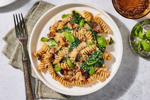 an image of the Baked Brie & Sun-Dried Tomato Pasta Credit: Photographer: Robby Lozano, Food Stylist: Marianne Williams, Prop Stylist: Josh Hoggle