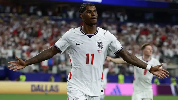 Penyerang Inggris #11, Marcus Rashford, merayakan setelah mencetak gol pada pertandingan Grup L Piala Dunia 2026 antara Inggris dan Kroasia di Stadion Dallas di Arlington pada 18 Juni 2026. (Aric Becker/AFP)