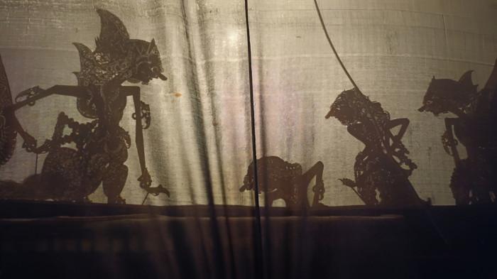 WAYANG KULIT- Ilustrasi kesenian wayang kulit yang merupakan tradisi masyarakat Jawa.