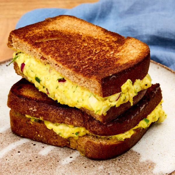 a recipe photo of The Creamiest Egg Salad Sandwich Credit: Photographer: Hannah Hufham, Food Stylist: Amanda Stanfield, Prop Stylist: Tucker Vines