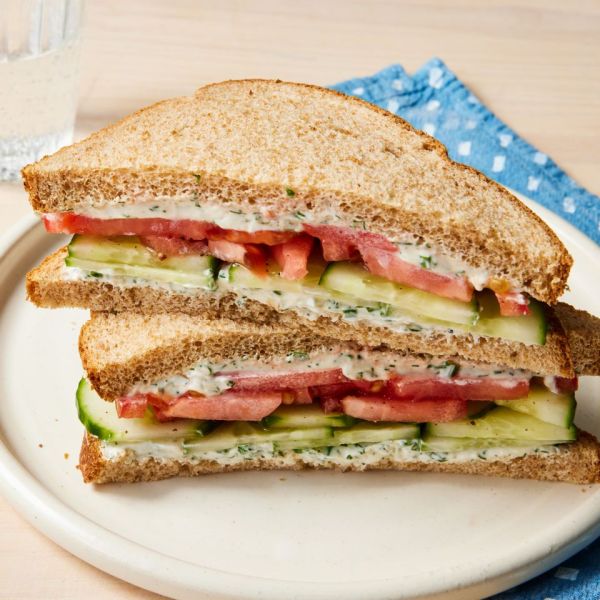 a recipe photo of the Cucumber & Tomato Sandwich Credit: Photographer: Stacy k. Allen, Props: Christina Brockman, Food Stylist: Jennifer Wendorf