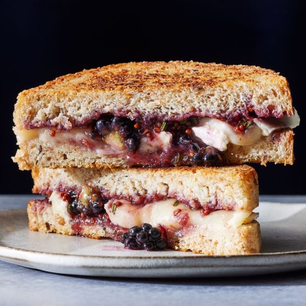 a recipe photo of the 5-Ingredient Brie & Blackberry Jam Grilled Cheese Credit: Photography: Rachel Marek, Food stylist: Lauren McAnelly, Prop stylist: Gabriel Greco