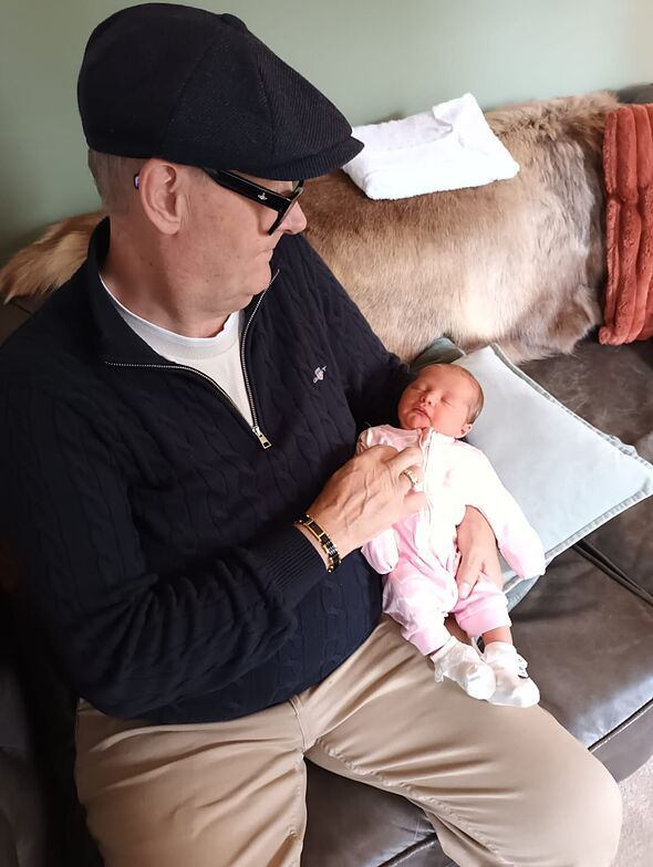 Mark Bond and grandchild Mark Bond and grandchild