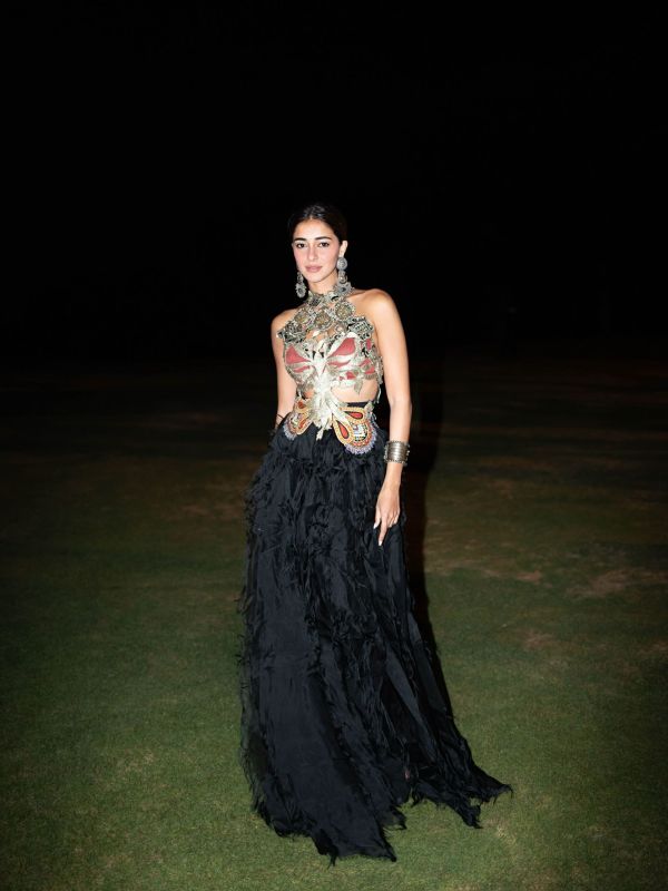 Image may contain Ananya Panday Clothing Dress Evening Dress Formal Wear Fashion Gown Adult Person Skin and Tattoo