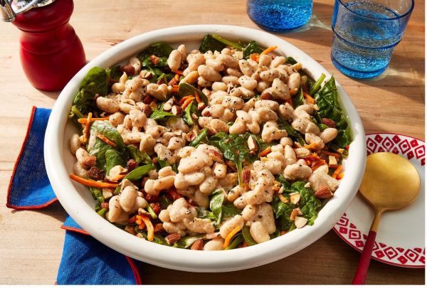 white bean salad with spinach, carrots, almonds in a serving bowl Credit: Photographer: Jen Causey, Food Stylist: Melissa Gray, Prop Stylist: Shell Royster