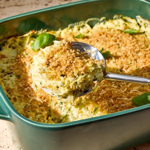 A recipe image of Shredded Zucchini Casserole. Credit: Photographer: Grant Webster, Food Stylist: Holly Dreesman, Prop Stylist: Dera Burreson.
