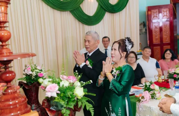 Mrs. Be Muoi and her husband burned incense for their ancestors in the presence of both families. Family photo provided