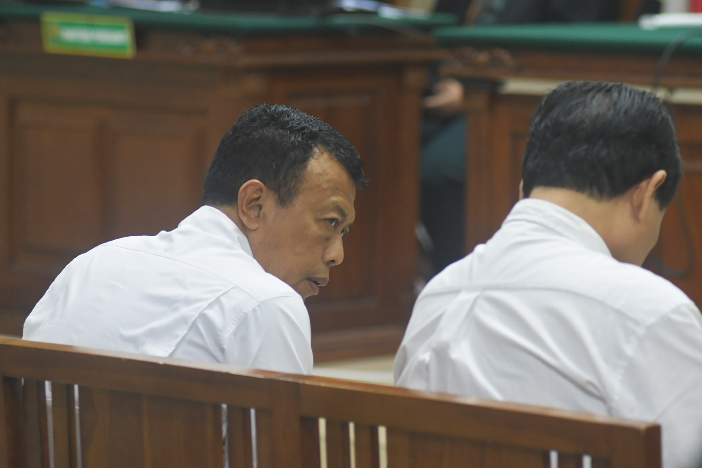 SIDANG TUNTUTAN - Bupati Ponorogo nonaktif, Sugiri Sancoko saat menjalani sidang dengan agenda pembacaan tuntutan oleh Jaksa Penuntut Umum (JPU) Komisi Pemberantasan Korupsi (KPK) di Pengadilan Tipikor Surabaya di kawasan Sedati, Sidoarjo, Selasa (14/7/2026). Sugiri Sancoko dituntut pidana penjara 7 Tahun & denda Rp 300 Juta. dr. Yunus Mahatma dituntut pidana penjara 5 tahun 6 bulan dengan denda Rp 360 juta. Agus Pramono (mantan Sekda Ponorogo) dituntut 4 tahun 8 bulan dan denda Rp 500 juta. SURYA/AHMAD ZAIMUL HAQ