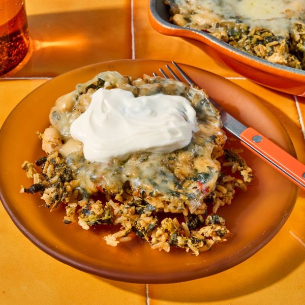 a recipe photo of the Cheesy White Bean & Rice Skillet Credit: Photographer: Jen Causey, Food Stylist: Julian Hensarling, Prop Stylist: Priscilla Montiel