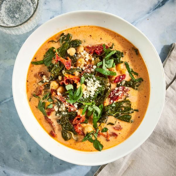 an image of the Marry Me Chickpea Soup with Kale Credit: Photographer: Jen Causey, Food Stylist: Margaret Monroe Dickey, Prop Stylist: Christina Daley