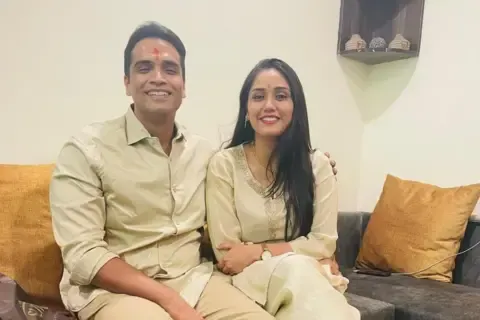 Photo credit Twisha's family Twisha with husband Samarth - both of them are dressed in yellow shirts and pants