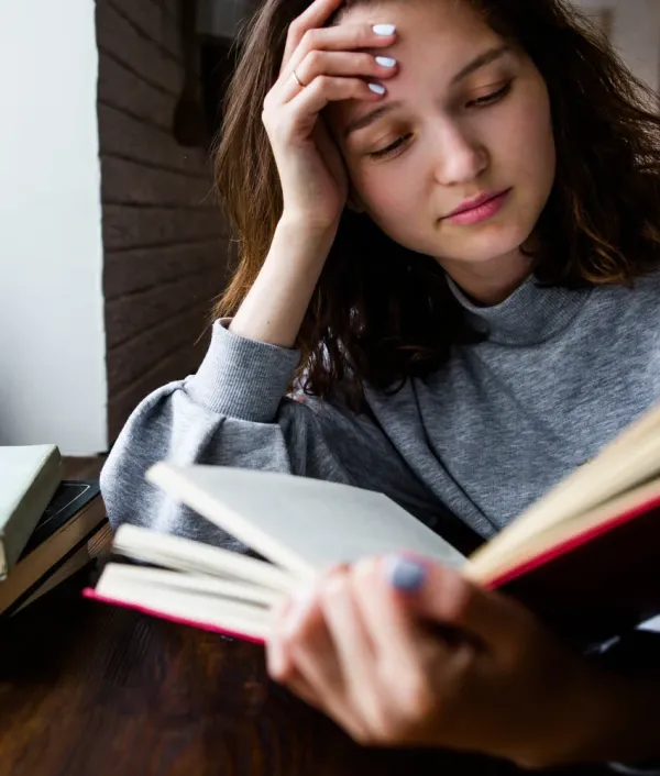 Woman who is emotionally strong reading a book as a hobby 