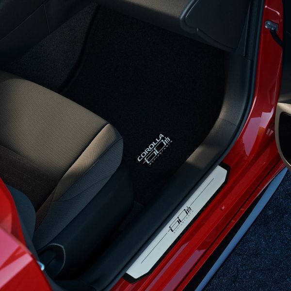 Black car floor mat with white