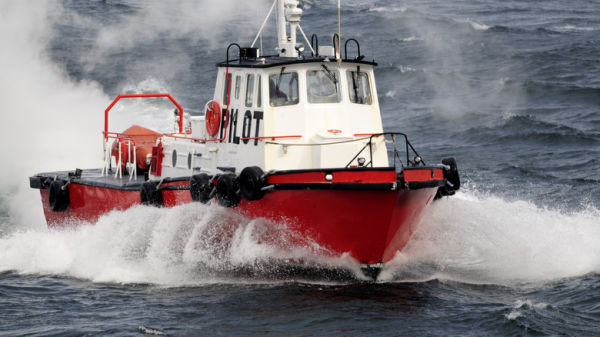 Close-up of a pilot boat on the water.