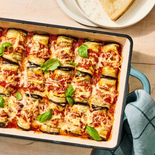a recipe photo of the Eggplant Rollatini Credit: Photographer: Morgan Hunt Glaze, Food Stylist: Ruth Blackburn, Prop Stylist: Christine Keely