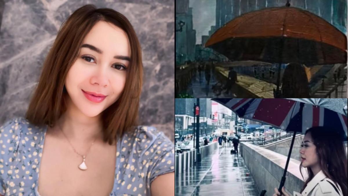 FOTO AURA KASIH - Aura Kasih sempat berfoto membawa payung di Manhattan, New York, Amerika Serikat. Foto Aura Kasih ternyata mirip dengan lukisan Ridwan Kamil.