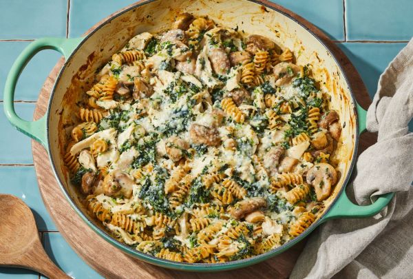 Overhead view of a skillet of Creamy Chicken, Mushroom & Spinach Skillet Casserole recipe Credit: Photographer: Rachel Marek, Food Stylist: Annie Probst