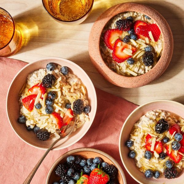 a recipe photo of the Bircher Muesli served in bowls with berries Credit: Photographer: Jen Causey, Food Stylist: Emily Nabors Hall