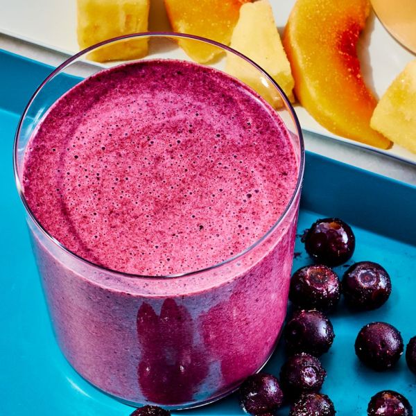 fruit & yogurt smoothie made with blueberries Credit: Photographer: Morgan Hunt Glaze, Food Stylist: Julian Hensarling, Prop Stylist: Shell Royster