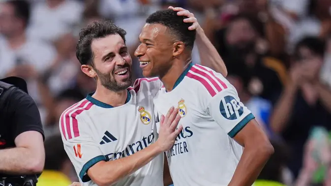 Pemain Real Madrid Bernardo Silva (kiri) dan Kylian Mbappe merayakan gol dalam laga La Liga Spanyol antara Real Madrid vs Real Sociedad di Madrid, Spanyol, Rabu, 26 Agustus 2026. (AP Photo/Manu Fernandez)