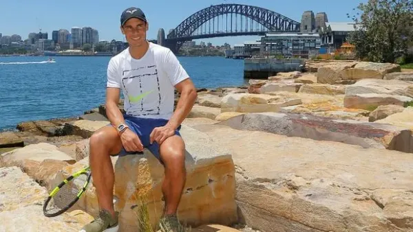 Tennis player Rafael Nadal of Spain poses for the cameras in front of the Sydney Harbour Bridge, January 9, 2017 before the Australian Open tennis tournament in Melbourne begins January 16.  REUTERS/Jason Reed