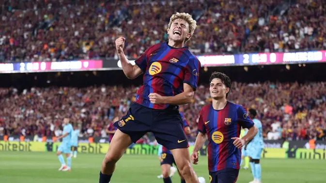 Barcelona Gelandang Barcelona, Fermin Lopez, merayakan gol yang dicetaknya ke gawang Athletic Club dalam laga tunda jornada pertama La Liga Spanyol di Camp Nou, Jumat (28/8/2026) dini hari WIB. (Josep LAGO / AFP)