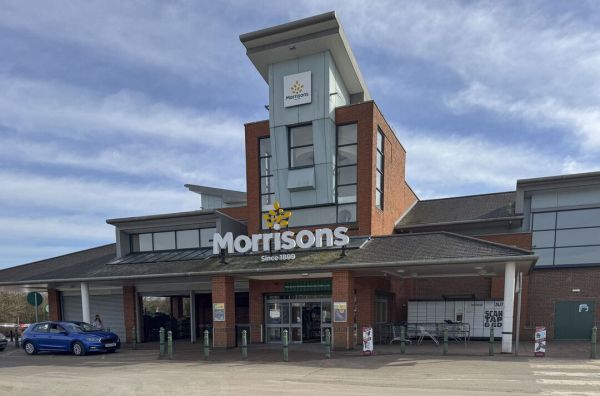 Exterior view of the front entrance of the Morrisons supermarke Exterior view of the front entrance of the Morrisons supermarke