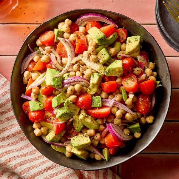 a photo of Avocado & Chickpea Salad Credit: Photographer: Jake Sternquist, Food Stylist: Sammy Mila, Prop Stylist: Gabriel Greco.