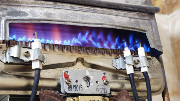 yellow and blue flames in a gas water heater
