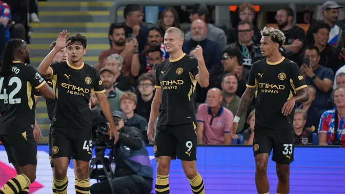 Pemain Manchester City, Erling Haaland, merayakan gol pembuka dalam pertandingan Liga Inggris melawan Crystal Palace di London, Sabtu (29/8/2026) dini hari WIB. (AP Photo/Kin Cheung)