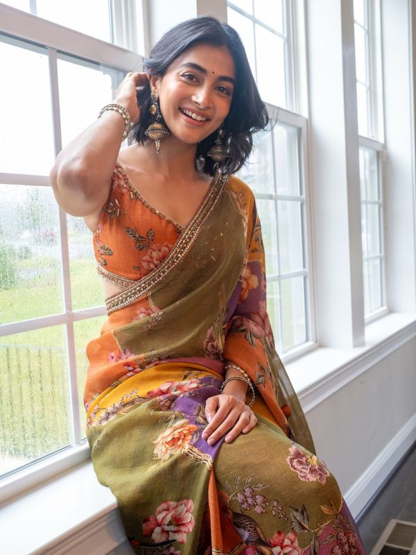 Image may contain Pooja Hegde Face Happy Head Person Smile Black Hair Hair and Dimples